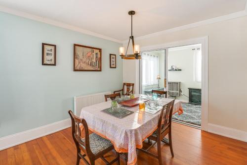 a dining room with a table and chairs at Close to Dtwn Bangor Inviting Maine Home in Veazie