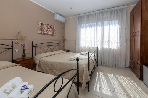 Cama o camas de una habitación en BeB Sant' ELIA