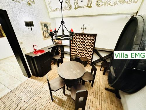 an overhead view of a dining room with a table and chairs at Luxury Spa Villa EMG Karlsruhe Baden-Baden Rastatt - Gernsbach in Gernsbach