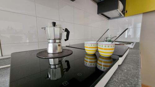 Una cocina o cocineta en Otium casa vacanze-servizio spiaggia incluso a 250 mt-struttura pet friendly