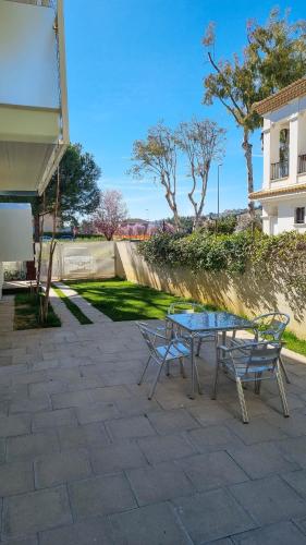 Un jardín fuera de Otium casa vacanze-servizio spiaggia incluso a 250 mt-struttura pet friendly