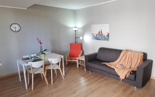 Un lugar para sentarse en Otium casa vacanze-servizio spiaggia incluso a 250 mt-struttura pet friendly