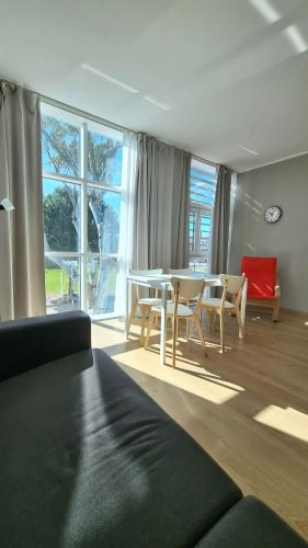 Un lugar para sentarse en Otium casa vacanze-servizio spiaggia incluso a 250 mt-struttura pet friendly