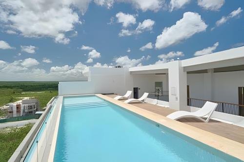 Бассейн в Sweet Home Luxury Cap Cana, impuestos incluidos. или поблизости