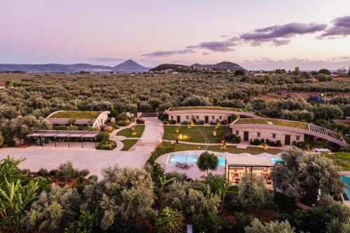 an aerial view of the villas at the resort at Nestor Luxury Villas in Romanós