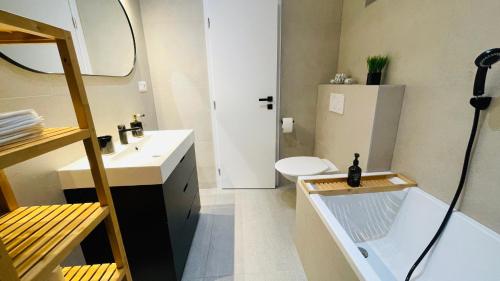 Ванная комната в House FLOW, 3 room, free 2 parking