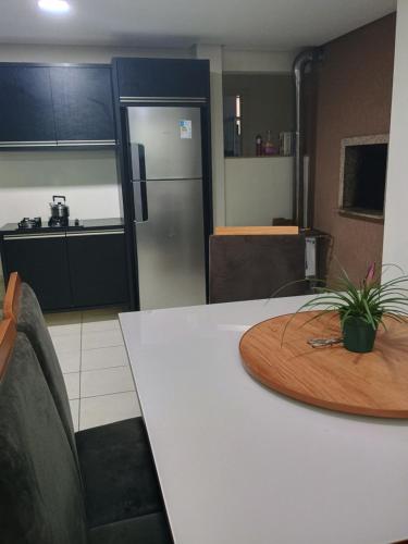 Dapur atau dapur kecil di Pensão com piscina e área de lazer