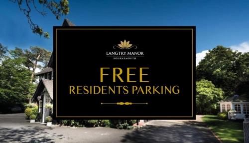 a sign that reads free residents parking in front of a house at Langtry Manor Hotel in Bournemouth