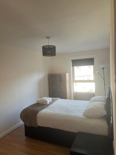 Ένα ή περισσότερα κρεβάτια σε δωμάτιο στο Riverview Retreat Shawlands