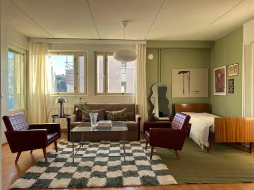 Χώρος καθιστικού στο 3BR rooftop with sauna and terrace