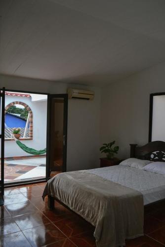 Llit o llits en una habitació de Casa MIYAK