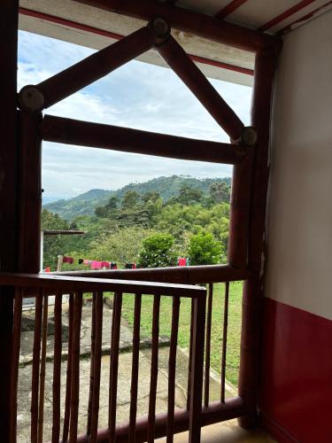 a view from a window of a mountain view at Finca La Macarena by Welttisch in Génova