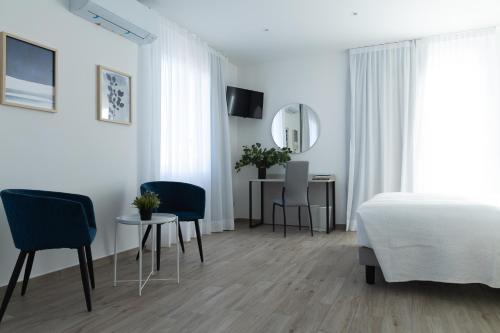 Postel nebo postele na pokoji v ubytování Albergo Sappia