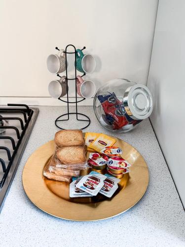 a plate of food on a counter next to a stove at Independent House a due passi dal Centro Storico in San Marino