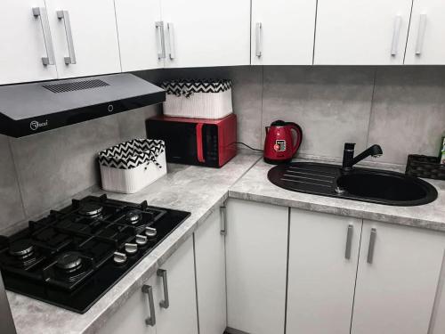 Η κουζίνα ή μικρή κουζίνα στο Hostel Płock