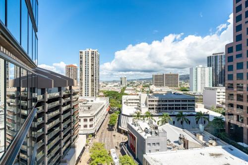 an aerial view of a city with tall buildings at Spacious Downtown Executive Retreat - Free Parking in Honolulu