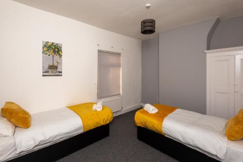 Ένα ή περισσότερα κρεβάτια σε δωμάτιο στο Modern 3 bed, sleeps 8