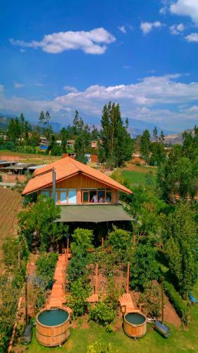 an overhead view of a house with a garden at Viscas Lodge in Carhuaz