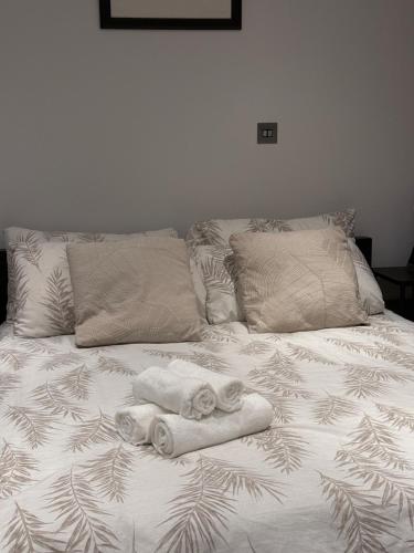 Ένα ή περισσότερα κρεβάτια σε δωμάτιο στο Cosy Guest Suite, West London