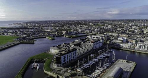 an aerial view of a city with a marina at Dockside Penthouse - Free Parking in Galway