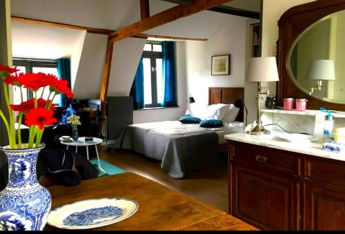 En eller flere senge i et værelse på Apartement with terras in Amsterdam Noord