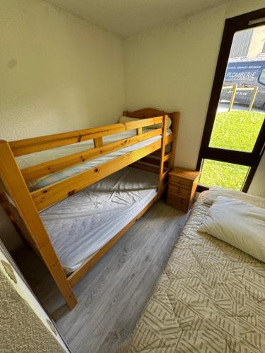 Postel nebo postele na pokoji v ubytování Cocon Vercors, Centre Village