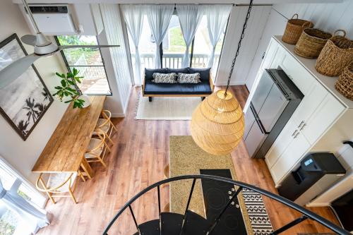 an overhead view of a living room with a couch at The Drifter - North Shore Loft - Relaxed Luxury in Kahuku