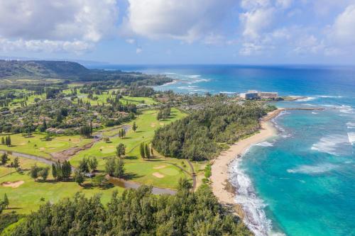 an aerial view of the beach and ocean at The Drifter - North Shore Loft - Relaxed Luxury in Kahuku