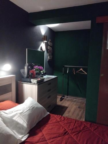 Postel nebo postele na pokoji v ubytování Caverna di panda