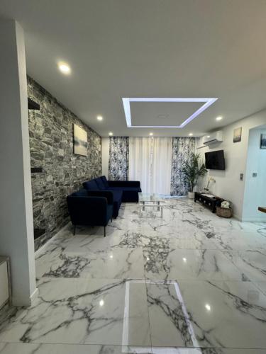 TV a/nebo společenská místnost v ubytování Palma Beach Apartment