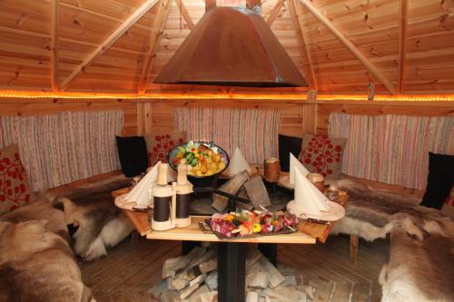 a room with a table with a bowl of food at Hotel Alexandra in Wels