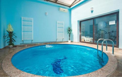 Kolam renang di atau dekat dengan Amazing Apartment In Kampor With Sauna