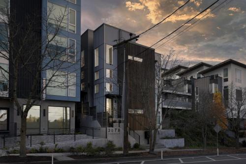 a rendering of a building on a city street at West Seattle - Mins to Downtown! in Seattle