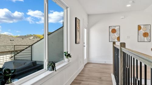 a room with a balcony with a large window at Sophisticated Dallas Retreat l Prime Location! in Dallas