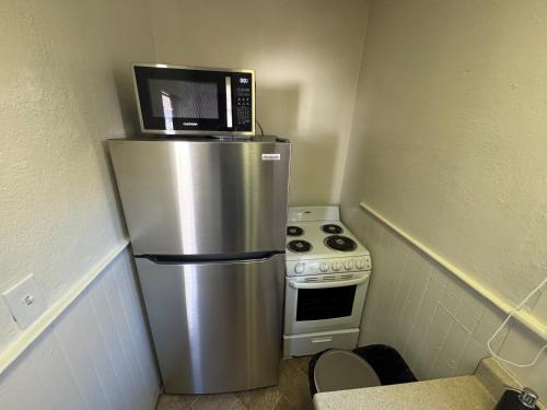 Kuchyň nebo kuchyňský kout v ubytování Midtown Hideaway 1 BR Nest