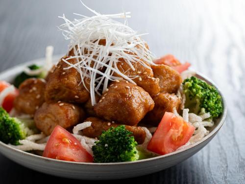 a bowl of food with meatballs broccoli and tomatoes at TAOYA Shirahama Senjyo in Shirahama