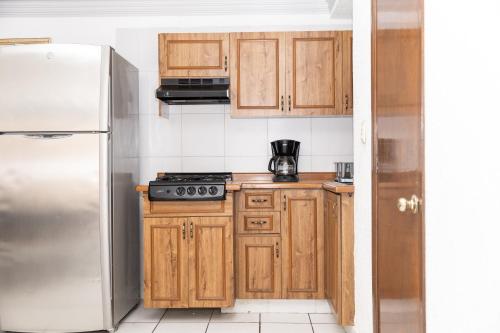 Kuchyň nebo kuchyňský kout v ubytování Lofts Oaxaca
