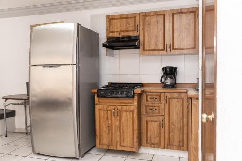 Kuchyň nebo kuchyňský kout v ubytování Lofts Oaxaca
