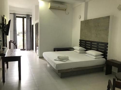 Katil atau katil-katil dalam bilik di Lavendra Villa Mirissa