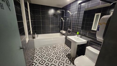 Ένα μπάνιο στο Pyeongtaek Gallery Hotel