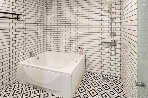 Ένα μπάνιο στο Pyeongtaek Gallery Hotel