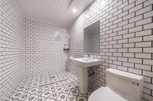 Ένα μπάνιο στο Pyeongtaek Gallery Hotel