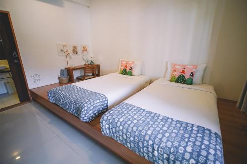 Sleepy House Chiang Raiにあるベッド