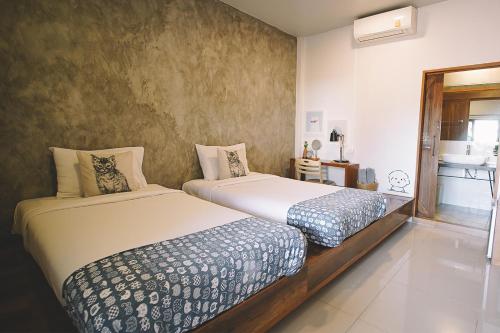 Sleepy House Chiang Raiにあるベッド