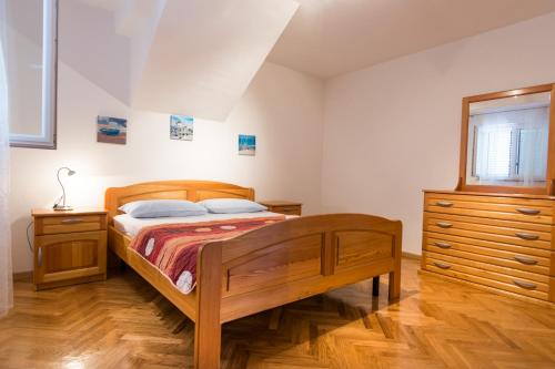 Posteľ alebo postele v izbe v ubytovaní Apartments Basilea