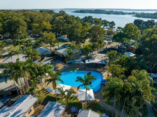 an aerial view of the pool at the resort at NRMA Blue Dolphin Yamba Holiday Resort in Yamba