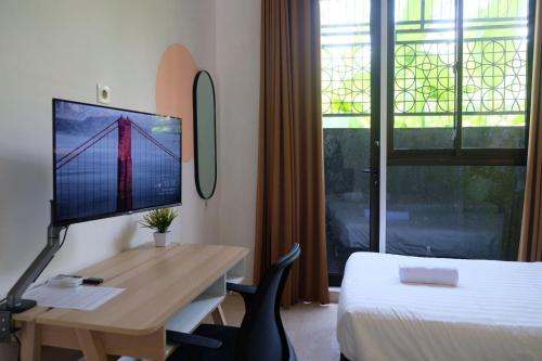 TV a/nebo společenská místnost v ubytování Olivia SOHO Guest House