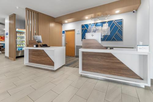 a lobby of a store with a checkout counter at Holiday Inn Express Salt Lake City South - Midvale by IHG in Midvale