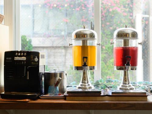 two blenders sitting on top of a counter at HOTEL THE CUBE Naha Kokusai Street in Naha