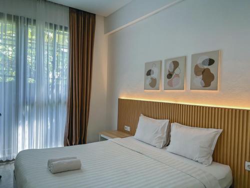 Ένα ή περισσότερα κρεβάτια σε δωμάτιο στο Olivia SOHO Guest House